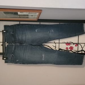 Distressed High Rise 3 Button Skinny Jeans